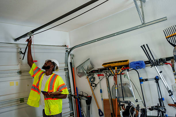 Professional Garage Door Panel Replacement technician working in Traer, IA